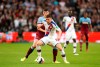 Crystal Palace's James McCarthy, right, and West Ham United's Declan Rice battle for the ball during the English Premier League soccer match at London Stadium, London, Saturday Oct. 5, 2019. (John Walton/PA via AP)