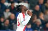 Crystal Palace's Michy Batshuayi celebrates scoring his sides first goal of the game against Leicester City during their English Premier League soccer match at the King Power Stadium in Leicester,England, Saturday Feb. 23, 2019. (Nigel French/PA via AP)