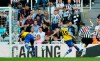 Newcastle United's Ayoze Perez, right, scores his side's first goal of the game of the game against Southampton, during their English Premier League soccer match at St James' Park in Newcastle, England, Saturday April 20, 2019. (Richard Sellers/PA via AP)