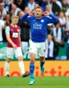 Leicester City's Jamie Vardy celebrates scoring his side's first goal of the game against Burnley, during their English Premier League soccer match at the King Power Stadium in Leicester, England, Saturday Oct. 19, 2019. (Nigel French/PA via AP)