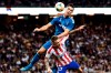 Juventus' Cristiano Ronaldo climbs to head the ball over Atletico Madrid's Kieran Trippier, during the International Champions Cup soccer match Juventus vs. Atletico Madrid at Friends Arena in Stockholm, Sweden, Saturday Aug. 10, 2019. (Erik Simander / TT via AP)