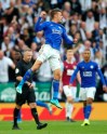 Leicester City's Jamie Vardy celebrates scoring his side's first goal of the game against Burnley, during their English Premier League soccer match at the King Power Stadium in Leicester, England, Saturday Oct. 19, 2019. (Nigel French/PA via AP)