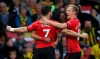 Southampton's Shane Long celebrates scoring his side's first goal of the game against Watford, during their English Premier League soccer match at Vicarage Road in Watford, London, England, Tuesday April 23, 2019. (Adam Davy/PA via AP)