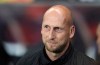 FILE - In this file photo dated Thursday, Sept. 19, 2019, Feyenoord's manager Jaap Stam before the Europa League group G soccer match against Rangers at Ibrox in Glasgow, Scotland. Feyenoord coach Jaap Stam has quit, Monday Oct. 28, 2019, a day after his team slumped to a 4-0 defeat at arch-rival Ajax. (AP Photo/Scott Heppell, FILE)
