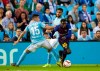 RC Celta's Olaza, left, challenges for the ball with Barcelona's Mousa Wague during a Spanish La Liga soccer match between RC Celta and Barcelona at the Balaidos stadium in Vigo, Spain, Saturday May 4, 2019. (AP Photo/Lalo R. Villar)