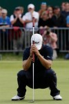 Adam Scott of Australia reacts after missing a putt on the 18th green at Royal Lytham & St Annes golf club during the final round of the British Open Golf Championship, Lytham St Annes, England Sunday, July 22, 2012. (AP Photo/Chris Carlson)