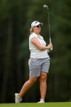 South Africa's Ashleigh Buhai hits a shot during the AIG Women's British Open golf championship at Woburn Gold Club near near Milton Keynes, England, Saturday, Aug. 3, 2019. (AP Photo/Tim Ireland)