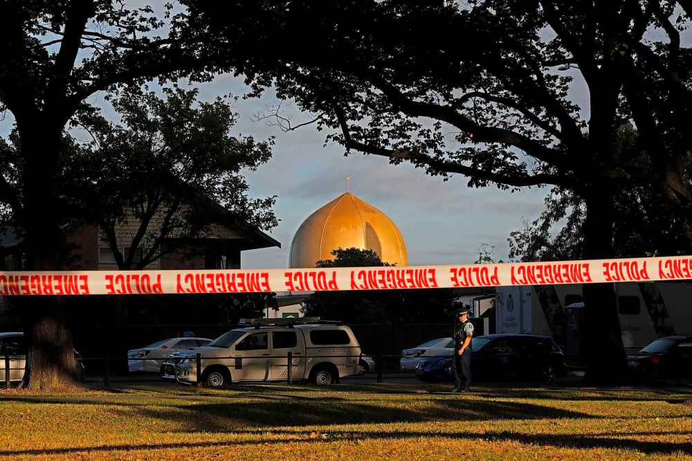 Vincent Yu / The Associated Press files
A police officer stands guard in front of the Masjid Al Noor mosque in Christchurch, New Zealand, where one of two mass shootings occurred.