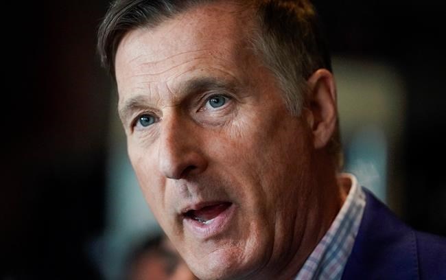 People's Party of Canada leader Maxime Bernier speaks at a news conference at the 3 Brasseurs restaurant in Quebec City on Friday, October 18, 2019. THE CANADIAN PRESS/Mathieu Belanger