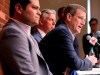 Boston Red Sox president Sam Kennedy, right, addresses the media during a news conference updating the status of former Boston Red Sox designated hitter David Ortiz at Fenway Park in Boston, Monday, June 10, 2019. Ortiz was shot at a bar Sunday night in his native Dominican Republic. Team assistant general manager Eddie Romero, left, and president of baseball operations Dave Dombrowski, center rear, look on. (AP Photo/Charles Krupa)