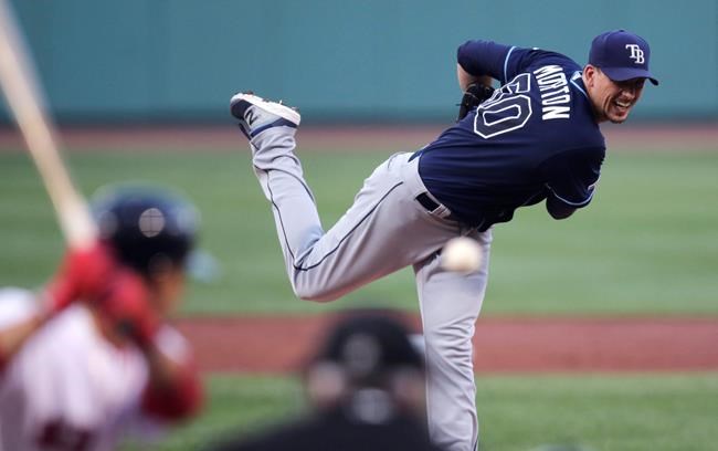 Tampa Bay Rays starting pitcher Charlie Morton delivers during the first inning against the Boston Red Sox in a baseball game at Fenway Park in Boston, Tuesday, July 30, 2019. (AP Photo/Charles Krupa)