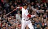 Boston Red Sox's Xander Bogaerts watches the flight of his two RBI double off Oakland Athletics starting pitcher Frankie Montas during the third inning of a baseball game at Fenway Park, Monday, April 29, 2019, in Boston. (AP Photo/Charles Krupa)