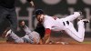 Boston Red Sox second baseman Marco Hernandez, right, collides with Chicago White Sox's Tim Anderson, who was caught trying to advance to second on his single during the fifth inning of a baseball game at Fenway Park in Boston, Tuesday, June 25, 2019. (AP Photo/Charles Krupa)
