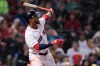 Boston Red Sox's Xander Bogaerts watches the flight of his two-run home run during the fifth inning of a baseball game against the Chicago White Sox at Fenway Park in Boston, Tuesday, June 25, 2019. (AP Photo/Charles Krupa)