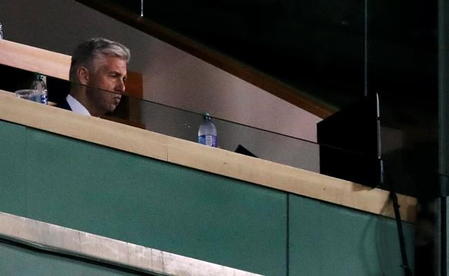 Dave Dombrowski, Boston Red Sox president of baseball operations, watches play against the Tampa Bay Rays during the seventh inning at Fenway Park in Boston, Wednesday, July 31, 2019. (AP Photo/Charles Krupa)