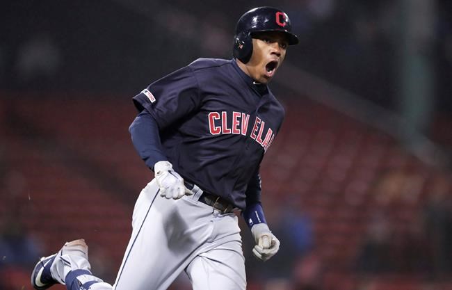 Cleveland Indians' Greg Allen yells as he rounds the bases on his two-run home run off Boston Red Sox relief pitcher Ryan Brasier during the ninth inning of a baseball game at Fenway Park in Boston, Tuesday, May 28, 2019. (AP Photo/Charles Krupa)