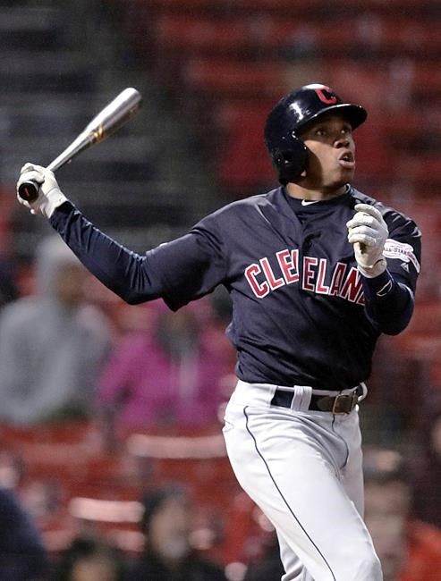 Cleveland Indians' Greg Allen watches the flight of his two-run home run off Boston Red Sox relief pitcher Ryan Brasier during the ninth inning of a baseball game at Fenway Park in Boston, Tuesday, May 28, 2019. (AP Photo/Charles Krupa)