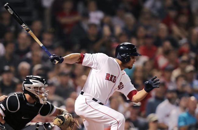 Boston Red Sox's Marco Hernandez follows through on his baseball game-winning bases-loaded single in the bottom of the ninth inning against the Chicago White Sox at Fenway Park in Boston, Monday, June 24, 2019. (AP Photo/Charles Krupa)