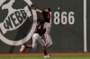 Baltimore Orioles right fielder Austin Hays (21) and left fielder Dwight Smith Jr. play a double off the wall by Boston Red Sox's Xander Bogaerts in the first inning of a baseball game at Fenway Park, Friday, Sept. 27, 2019, in Boston. (AP Photo/Elise Amendola)