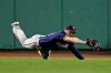 Minnesota Twins center fielder Jake Cave dives to catch a line drive by Boston Red Sox's Christian Vazquez in the seventh inning of a baseball game at Fenway Park, Thursday, Sept. 5, 2019, in Boston. (AP Photo/Elise Amendola)
