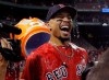Boston Red Sox's Mookie Betts is doused after their victory over the New York Yankees in a baseball game at Fenway Park, Friday, July 26, 2019, in Boston. (AP Photo/Elise Amendola)