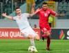 Malta's John Mintoff, right, and Spain's Mario Hermoso vie for the ball during the Euro 2020 group F qualifying soccer match between Malta and Spain at the national stadium Ta Qali Malta, Tuesday, March 26, 2019. (AP Photo/Rene Rossignaud)