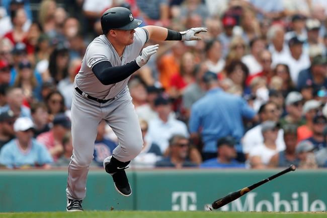 New York Yankees' Luke Voit runs on his single during the first inning of a baseball game against the Boston Red Sox in Boston, Saturday, July 27, 2019. (AP Photo/Michael Dwyer)