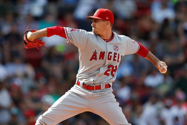Los Angeles Angels' Andrew Heaney pitches during the first inning of a baseball game against the Boston Red Sox in Boston, Saturday, Aug. 10, 2019. (AP Photo/Michael Dwyer)