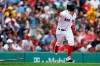 Boston Red Sox's Brock Holt runs on his game-winning RBI single during the 10th inning of a baseball game against the Kansas City Royals that was suspended by rain with the scored tied on Aug. 8, and continued at Fenway Park in Boston, Thursday, Aug. 22, 2019. (AP Photo/Michael Dwyer)