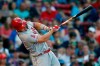 Los Angeles Angels' Mike Trout follows through on a two-run home run during the sixth inning of a baseball game against the Boston Red Sox in Boston, Saturday, Aug. 10, 2019. (AP Photo/Michael Dwyer)