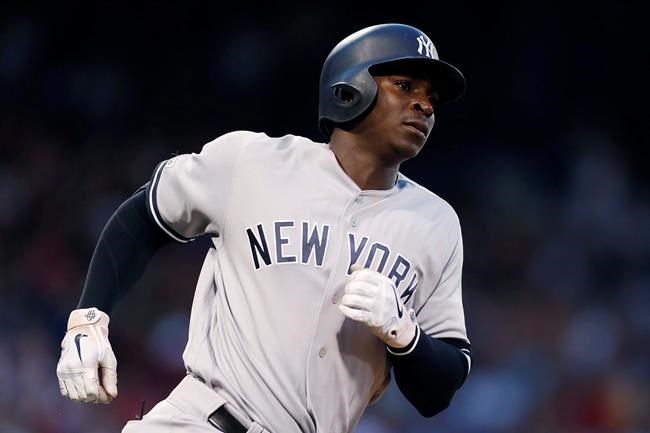 New York Yankees' Didi Gregorius runs on his two-run home run during the fourth inning of a baseball game against the Boston Red Sox in Boston, Sunday, July 28, 2019. (AP Photo/Michael Dwyer)