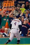 Houston Astros fans celebrate a two-run home run by George Springer (4) during the eighth inning of the team's baseball game against the Boston Red Sox in Boston, Friday, May 17, 2019. (AP Photo/Michael Dwyer)