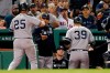 New York Yankees' Mike Tauchman (39) celebrates his two-run home run, that also drove in Gleyber Torres (25), during the fourth inning of a baseball game against the Boston Red Sox in Boston, Sunday, Sept. 8, 2019. (AP Photo/Michael Dwyer)