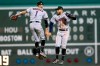 Houston Astros' Carlos Correa (1) and George Springer (4) celebrate after defeating the Boston Red Sox in a baseball game in Boston, Saturday, May 18, 2019. (AP Photo/Michael Dwyer)