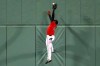 Boston Red Sox's Jackie Bradley Jr. makes the catch a fly-out by Baltimore Orioles' Joey Rickard during the eighth inning of a baseball game in Boston, Friday, April, 12, 2019. (AP Photo/Michael Dwyer)