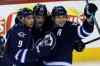 Trevor Hagan / Winnipeg Free Press
Winnipeg Jets' Evander Kane (9), Mark Scheifele (55) and Mark Stuart (5) celebrate after Scheifele opened the scoring against the Toronto Maple Leafs at MTS Centre in Winnipeg on Saturday. The Jets won in overtime 5-4.