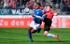Hannover's Kevin Wimmer, right, and Schalkes Breel Embolo challenge for the ball during the German Bundesliga soccer match between Hannover 96 and FC Schalke 04 in Hannover, Germany, Sunday, Marc 31, 2019. (Peter Steffen/dpa via AP)