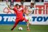Duesseldorf's Matthias Zimmermann, left, and Gladbach's Jonas Hofmann challenge for the ball during the German Bundesliga soccer match between Fortuna Duesseldorf and Borussia Moenchengladbach in Duesseldorf, Germany, Saturday, March 30, 2019. (Federico Gamberini/dpa via AP)