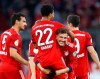 Munich Leon Goretzka, 2nd right, celebrates with Serge Gnabry who scored his side's fourth goal during the German Soccer Cup match between FC Bayern Munich and 1. FC Heidenheim in Munich, Germany, Wednesday, April 3, 2019. (AP Photo/Matthias Schrader)