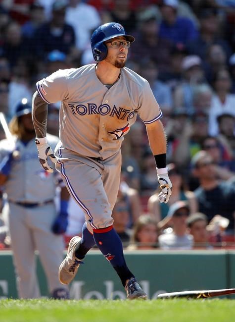 Toronto Blue Jays' Eric Sogard watches the flight of his home run off a pitch by Boston Red Sox's Josh Smith in the eighth inning of a baseball game in Boston, Sunday, June 23, 2019. (AP Photo/Steven Senne)