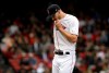 Boston Red Sox pitcher Chris Sale wipes his face on his jersey as he steps off the mound after throwing in the fourth inning of a baseball game against the Tampa Bay Rays at Fenway Park, Sunday, April 28, 2019, in Boston. (AP Photo/Steven Senne)