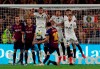Barcelona forward Lionel Messi takes a free kick during the Copa del Rey soccer match final between Valencia CF and FC Barcelona at the Benito Villamarin stadium in Seville, Spain, Saturday. 25, 2019. (AP Photo/Miguel Morenatti)