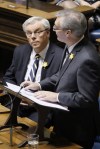 John Woods / The Canadian Press files 
Manitoba Premier Greg Selinger (left) listens in as his then-finance minister Stan Struthers announces the PST increase while introducing the budget on April 16, 2013.