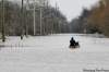 John Woods / The Canadian Press
A resident of Marchand Road, south of Winnipeg, paddles his canoe home Monday, April 20, 2009. Normal weather conditions would bring similar flood levels to the province this year, forecasters said today.