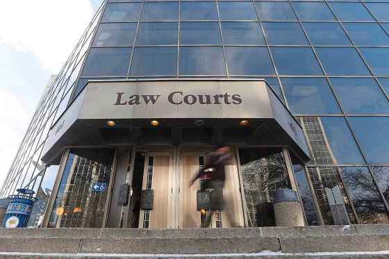 CPPeople enter the Law Courts in Winnipeg on Monday, February 5, 2018. A Manitoba judge is calling for changes following the death of Indigenous teenaged girl who spent most of her life in the child welfare system. Provincial court judge Shauna Hewitt-Michta is calling for a review to see whether there are enough secure foster placements in the province for high-risk youth. THE CANADIAN PRESS/John Woods