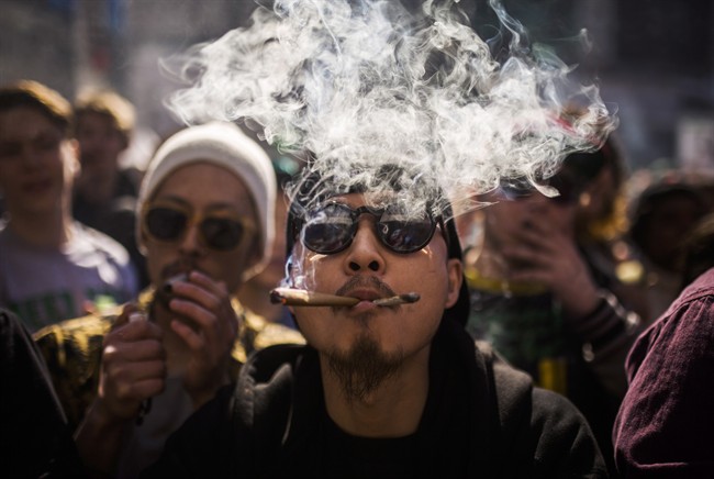 A man smokes marijuana during the