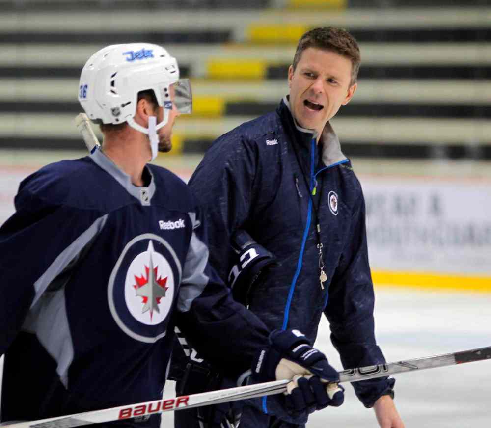 Coach Keith McCambridge, right, at the Winnipeg Jets 2015 development camp at MTS Iceplex.