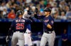Minnesota Twins' Jason Castro (15) celebrates his home run with Byron Buxton (25) during the second inning of MLB baseball action against the Toronto Blue Jays in Toronto, Monday May 6, 2019. THE CANADIAN PRESS/Mark Blinch
