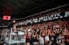 Nice soccer fans cheer for Bob Ratcliffe under a banner that reads 