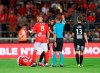 Brest's Jean-Charles Castellettto is given a yellow card during the French League One soccer match between Nimes and Brest at the Stade des Costières in Nimes, southern France, Saturday, Aug. 31, 2019. (AP Photo/Daniel Cole)